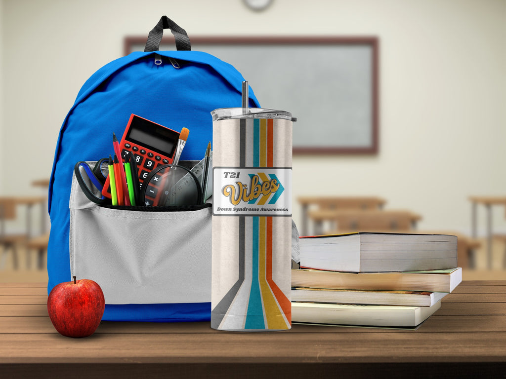 Educational Supplies and Drinkware on Classroom Desk
