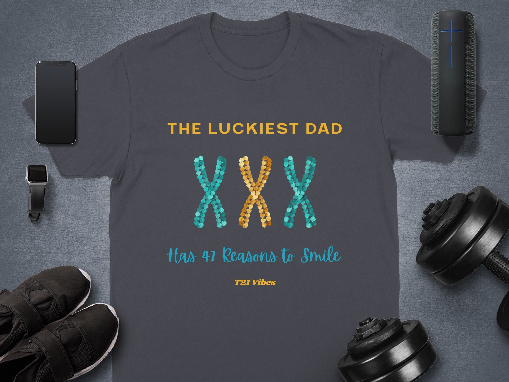 Dark grey t-shirt with "The Luckiest Dad" and "Has 47 Reasons to Smile" on it.