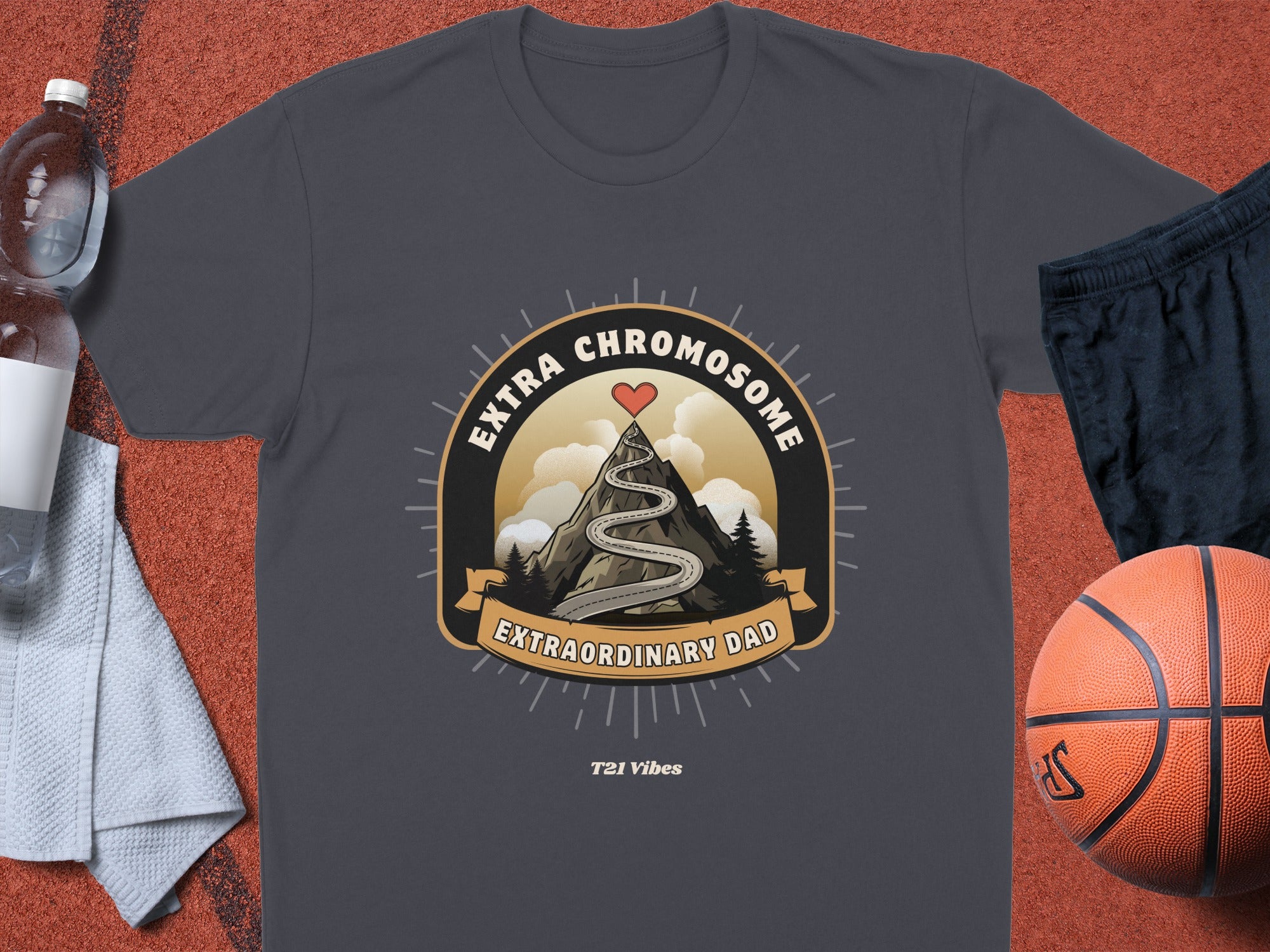 Dark grey t-shirt with "Extraordinary Dad" and heart, mountain, and road graphic.